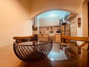 a kitchen with a bowl on a glass table at Apartments Klara in Donja Lastva