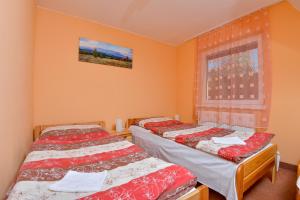 Postel nebo postele na pokoji v ubytování Apartments ADANA