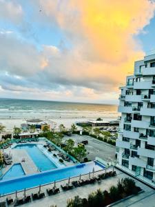 a view of a hotel and the beach at Heaven Infinity Sunrise Pool & SPA in Mamaia Sat/Năvodari