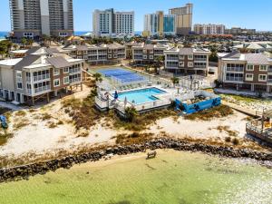 an aerial view of a resort property with a pool at Soundside Holiday Beach Resort in Pensacola Beach