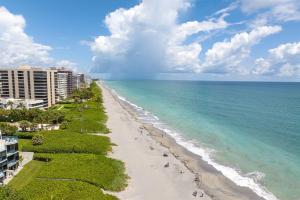 an aerial view of the beach and the ocean at ON The Beach Juno! 3-Top Rated Villa! in Juno Beach +43 photos