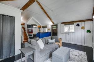 a living room with a couch and a kitchen at Cozy Bungalow 7 Blocks from ND Campus in South Bend