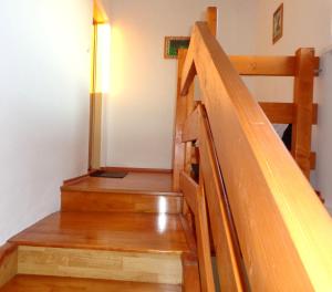 A bed or beds in a room at Penzión Gardoš