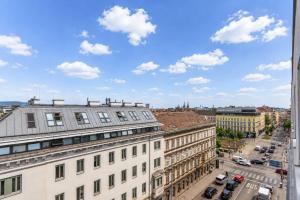 a view of a city street with buildings at Luci House Boutique Hostel - Vienna 15th district in Vienna