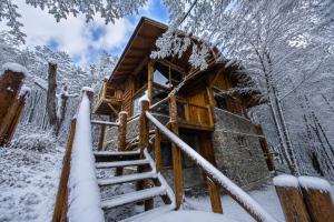 a log cabin in the snow at Patagonia Villa in Ushuaia