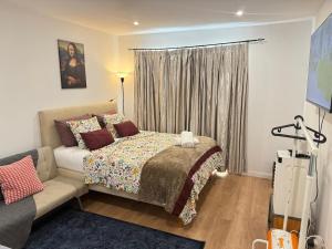 Llit o llits en una habitació de Loft Lisbon 6 fotos més