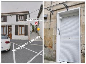 a garage door and a white car parked in a parking lot at République Le Nid Douillet in Saint-Dizier