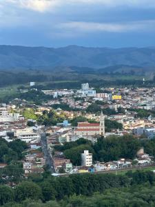an aerial view of a city with mountains in the background at Hospedaria São Francisco in Cachoeira Paulista +7 photos