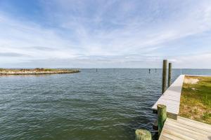 a dock on a large body of water at Gallops Point in Greenbackville