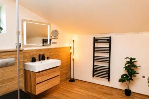 a bathroom with a sink and a mirror at Luxury Sea Residence by Kristina in Tivat +111 photos