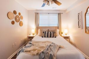 a bedroom with a large bed with two night stands at Spacious 3 Bed Condo Near ETSU in Johnson City