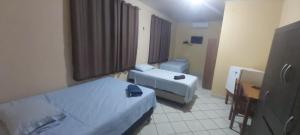 MK HOTEL Juruti 객실 침대