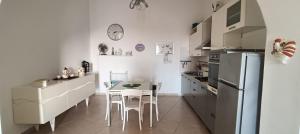Virtuvė arba virtuvėlė apgyvendinimo įstaigoje La casa in campagna