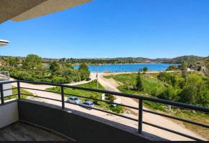 a balcony with a view of a lake at Mia Apartment in Veles