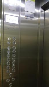 a metal elevator with a control panel on it at Shackleton in Wilde
