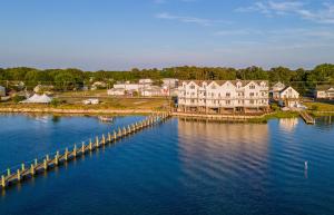 an aerial view of a large house on the water at Paradise in Chincoteague
