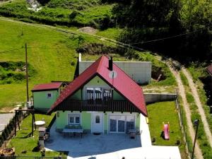 an aerial view of a house with a red roof at Villa sul lago in Jajce