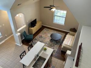 an overhead view of a living room with a table at Boho Chic Lovely Garden Home in Spring
