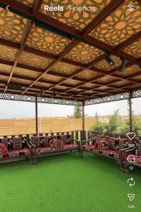 a view of the gymnasium with green grass at مزرعة اننتارا in Amman +23 photos