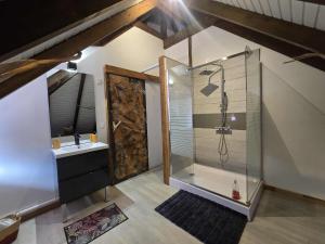 a bathroom with a shower and a sink at Villa Fareatai in Ataiti +31 photos