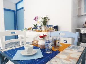 A kitchen or kitchenette at Camere D'Aragona