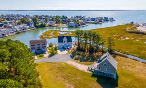 an aerial view of a house on an island in the water at The Baywatch Bungalow in Greenbackville