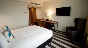 Televisor o centre d'entreteniment de The Ellen Hotel, an Ascend Collection Hotel