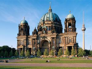 a large building with two domes on top of it at Novotel Berlin Mitte in Berlin