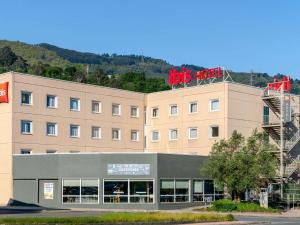 a building with arets hotel sign on top of it at Ibis Bilbao Barakaldo in Barakaldo