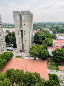 an aerial view of a city with tall buildings at Lagom 406 Habitación en depa duplex in Mexico City