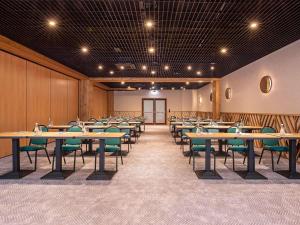 a conference room with tables and chairs in it at Mercure Karpacz Skalny in Karpacz +268 photos