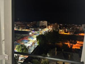a view of a city at night at House Mei in Oruro