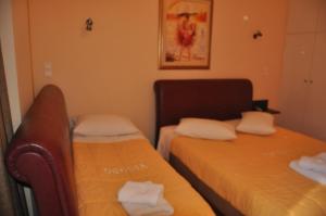 Letto o letti in una camera di Hotel Drosia