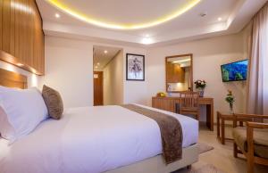 Postel nebo postele na pokoji v ubytování Hotel Ayoub & Spa