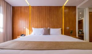 Postel nebo postele na pokoji v ubytování Hotel Ayoub & Spa
