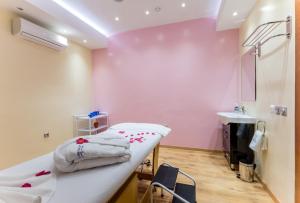 Postel nebo postele na pokoji v ubytování Hotel Ayoub & Spa