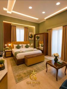 a hotel room with a bed and a table at GA Cairo Hotel Downtown in Cairo +10 photos
