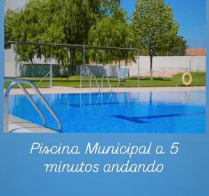 a large swimming pool with a blue water at Casa Luisa Archivel in Archivel