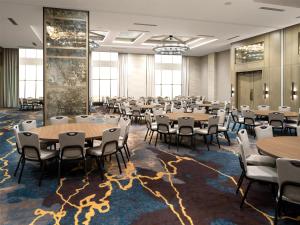 a large banquet hall with tables and chairs at Grand Hyatt Deer Valley in Park City