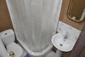 Koupelna v ubytování Cabaña hostal Ema