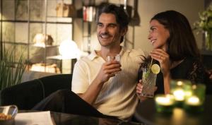 a man and a woman sitting at a table with drinks at Best Western Hotel Nürnberg am Hauptbahnhof in Nuremberg