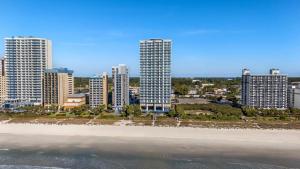 an aerial view of a beach and buildings at Hilton Grand Vacations Club Ocean 22 Myrtle Beach in Myrtle Beach