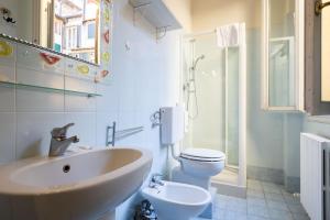 a bathroom with a sink and a toilet at Nel Cuore di Bologna L ,Bologna by Shortholidays in Bologna