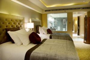 北京燕京饭店Yanjing Hotel客房内的一张或多张床位