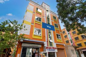 a building with aww sign in front of it at Via Ayush Villa, Hiland Park in Kolkata