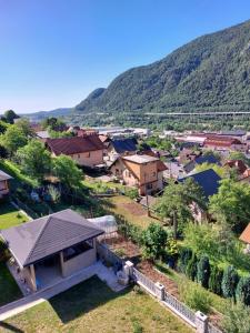 an aerial view of a small town with a mountain at Sofija 1 in Jesenice