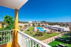 a balcony with a view of a resort at Comitas Isla del Aire in Punta Prima
