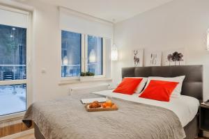 Postel nebo postele na pokoji v ubytování Apartamenty MISTRAL