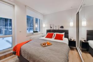 Postel nebo postele na pokoji v ubytování Apartamenty MISTRAL