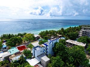 an aerial view of a city and the ocean at Ocean Bounty in Ukulhas
